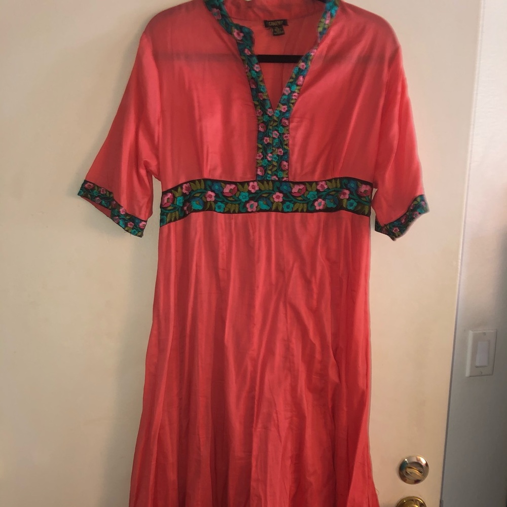 Gorgeous coral dress with flower accent